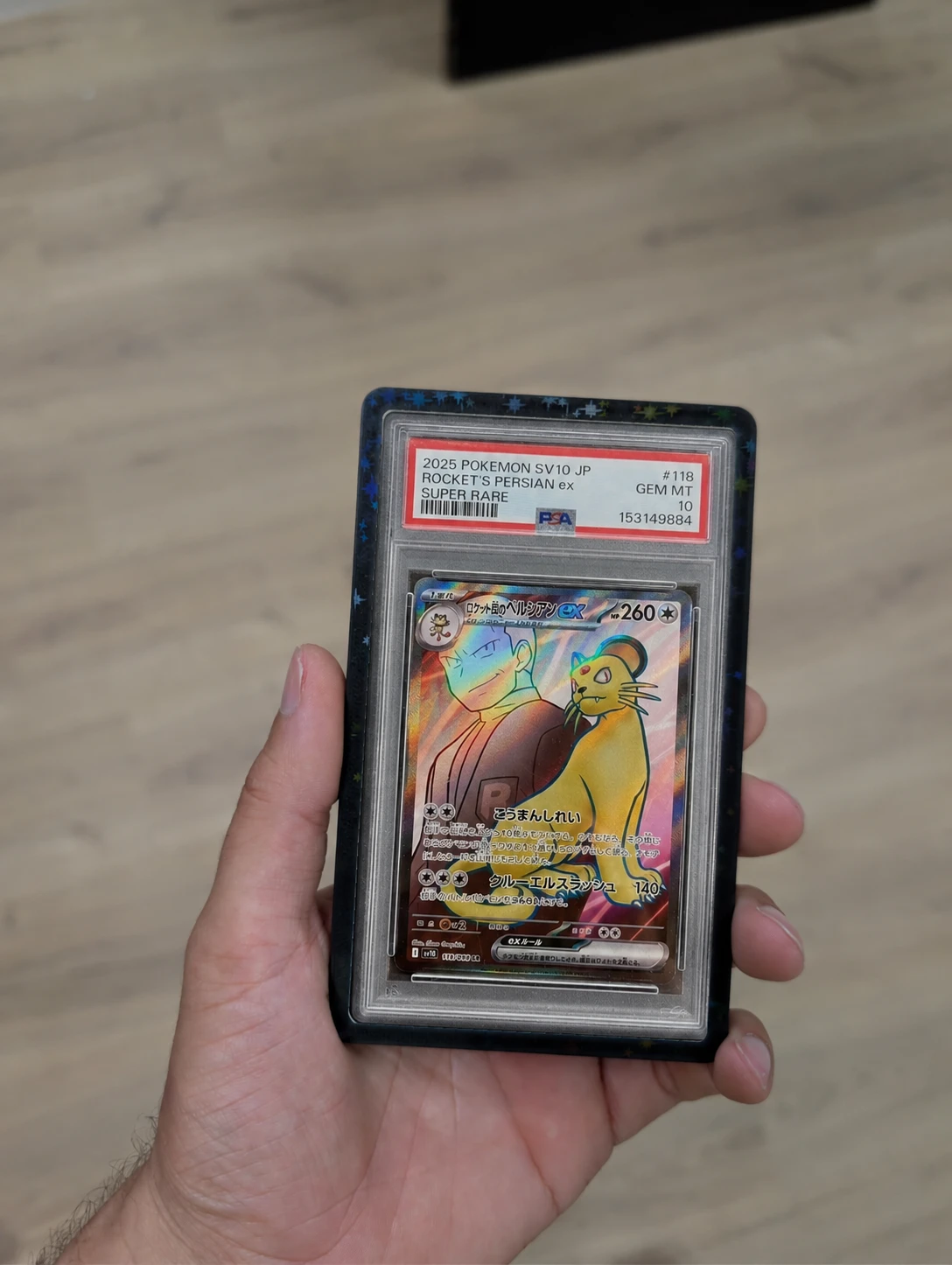 Carta Rocket's Persian ex PSA 10 en protector OBSIDIAN